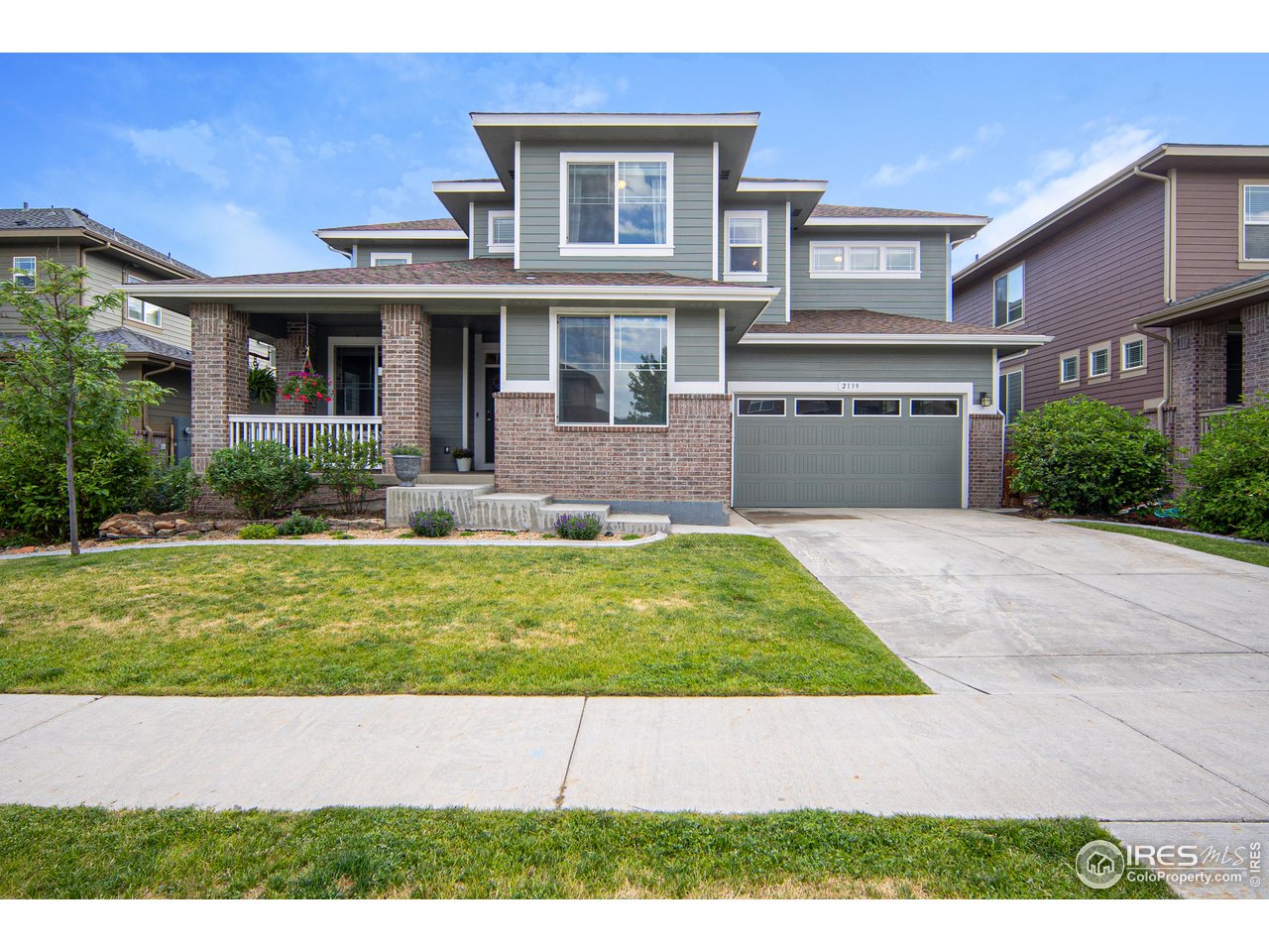 2139 Blue Yonder Way Fort Collins, CO 80525 - Photo 1 of 37 a house view with a garden space