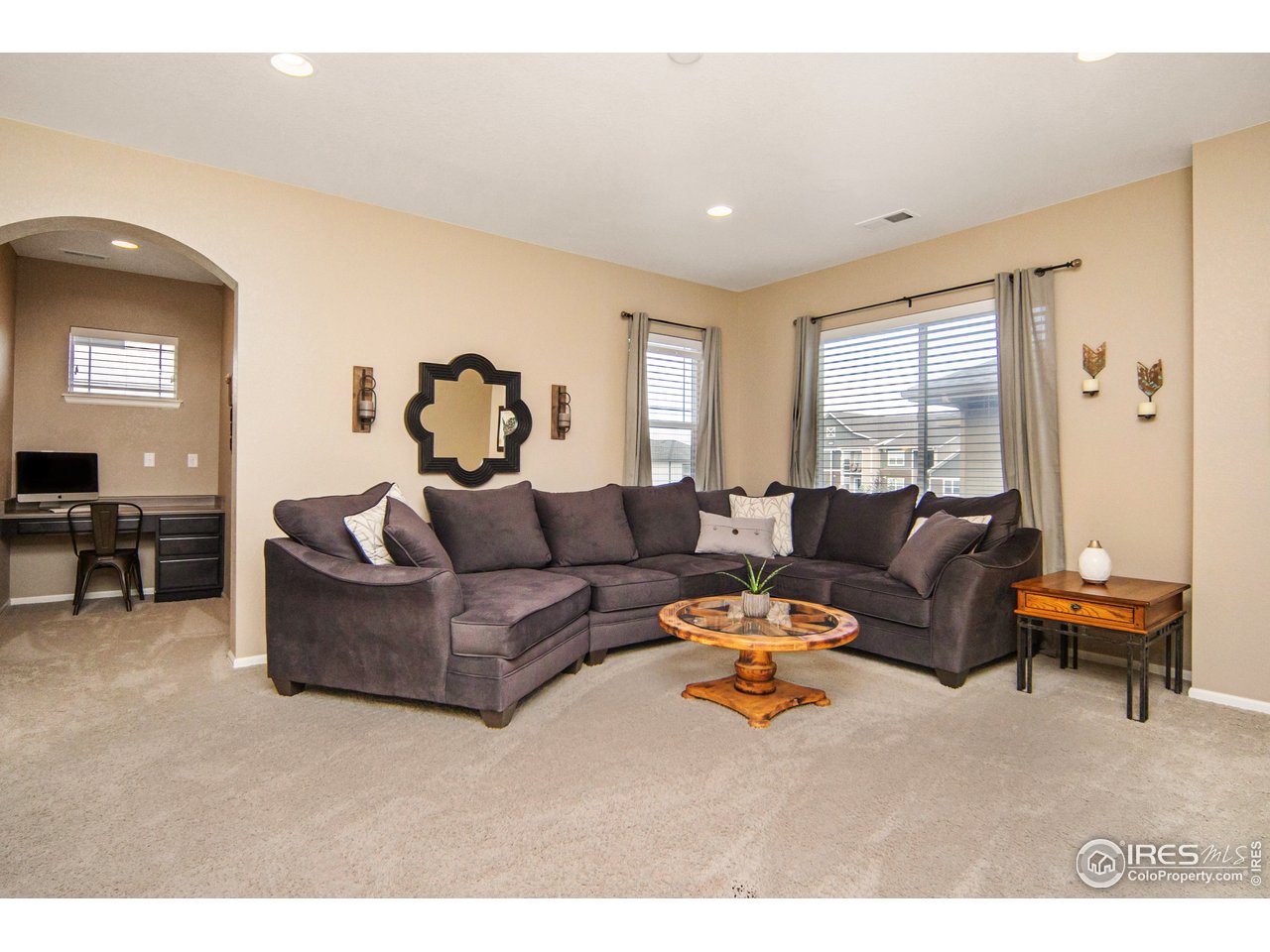 2139 Blue Yonder Way Fort Collins, CO 80525 - Photo 21 of 37 a living room with furniture and a large window