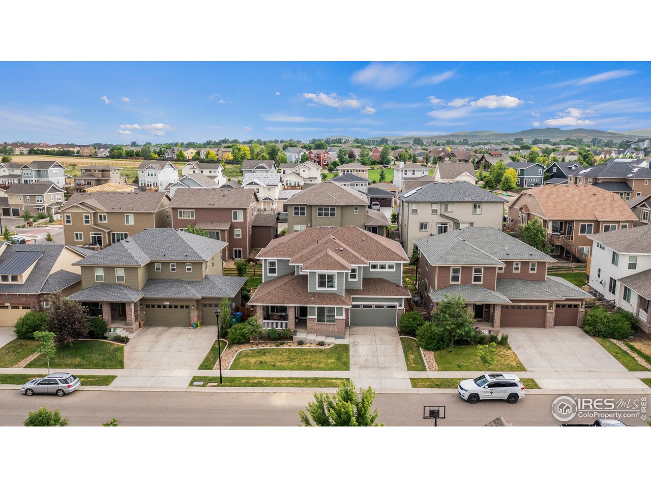2139 Blue Yonder Way Fort Collins, CO 80525 - Photo 4 of 37 a picture of houses with a city view