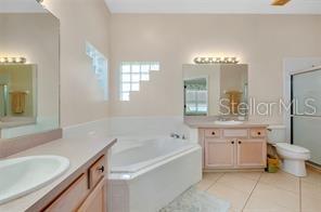 4325 Wordsworth Way Venice, FL 34293 - Photo 18 of 24 a bathroom with a tub sink and mirror