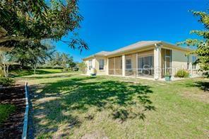 4325 Wordsworth Way Venice, FL 34293 - Photo 22 of 24 a front view of a house with a yard