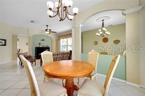 4325 Wordsworth Way Venice, FL 34293 - Photo 7 of 24 a view of a dining room with furniture and chandelier