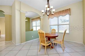 4325 Wordsworth Way Venice, FL 34293 - Photo 8 of 24 a view of a dining room with furniture window and outside view