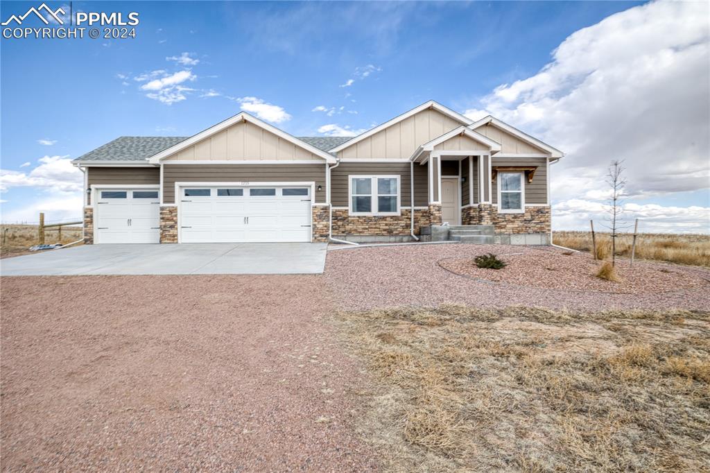 Charming modular home nestled on 40 acres of picturesque land in the community of Yoder.