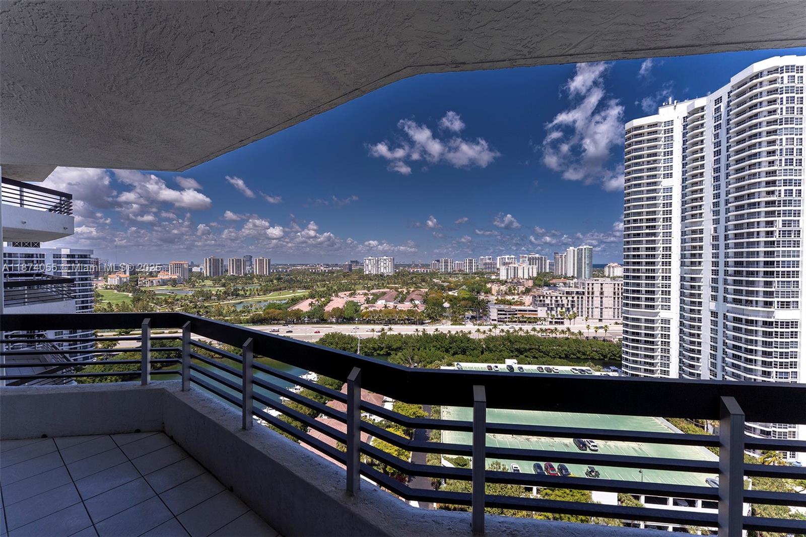 3530 Mystic Pointe Drive, Unit 2207 Aventura, FL 33180 - Photo 20 of 26 a view of city from balcony