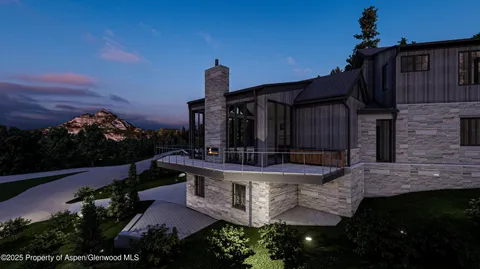 a view of fountain in front of house