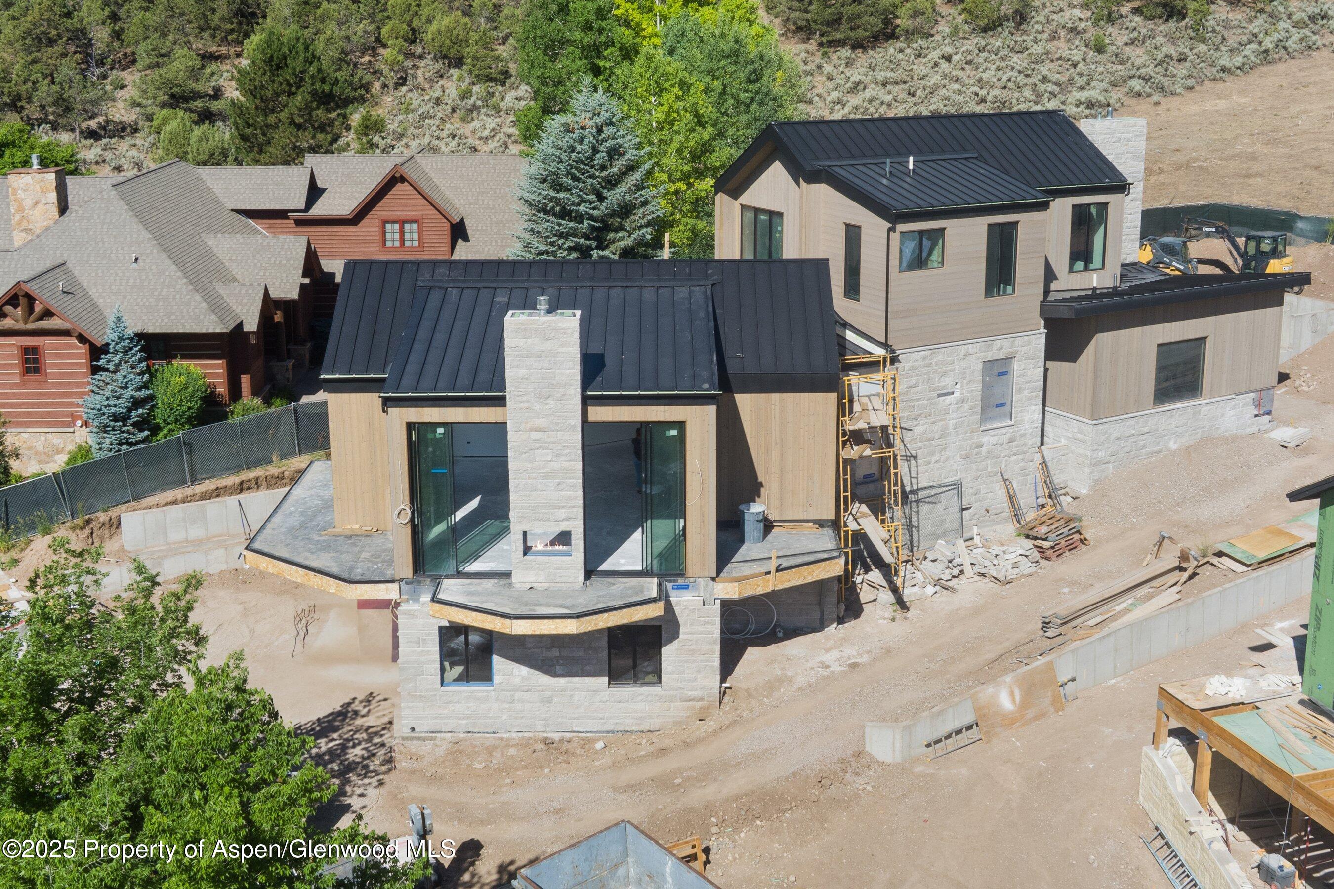 769 Perry Ridge Carbondale, CO 81623 - Photo 5 of 36 an aerial view of a house with swimming pool and porch