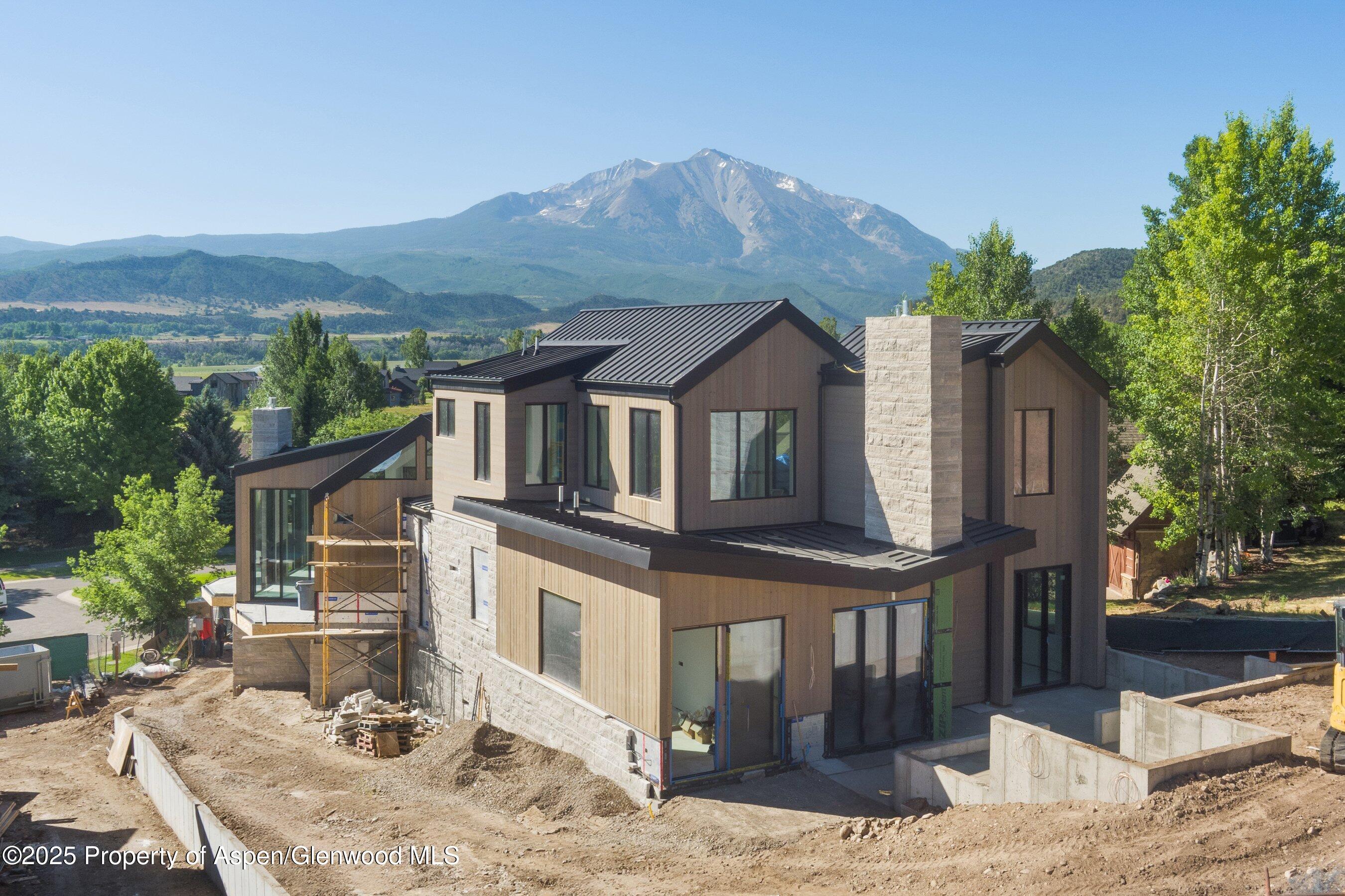 769 Perry Ridge Carbondale, CO 81623 - Photo 6 of 36 a front view of a house with a yard