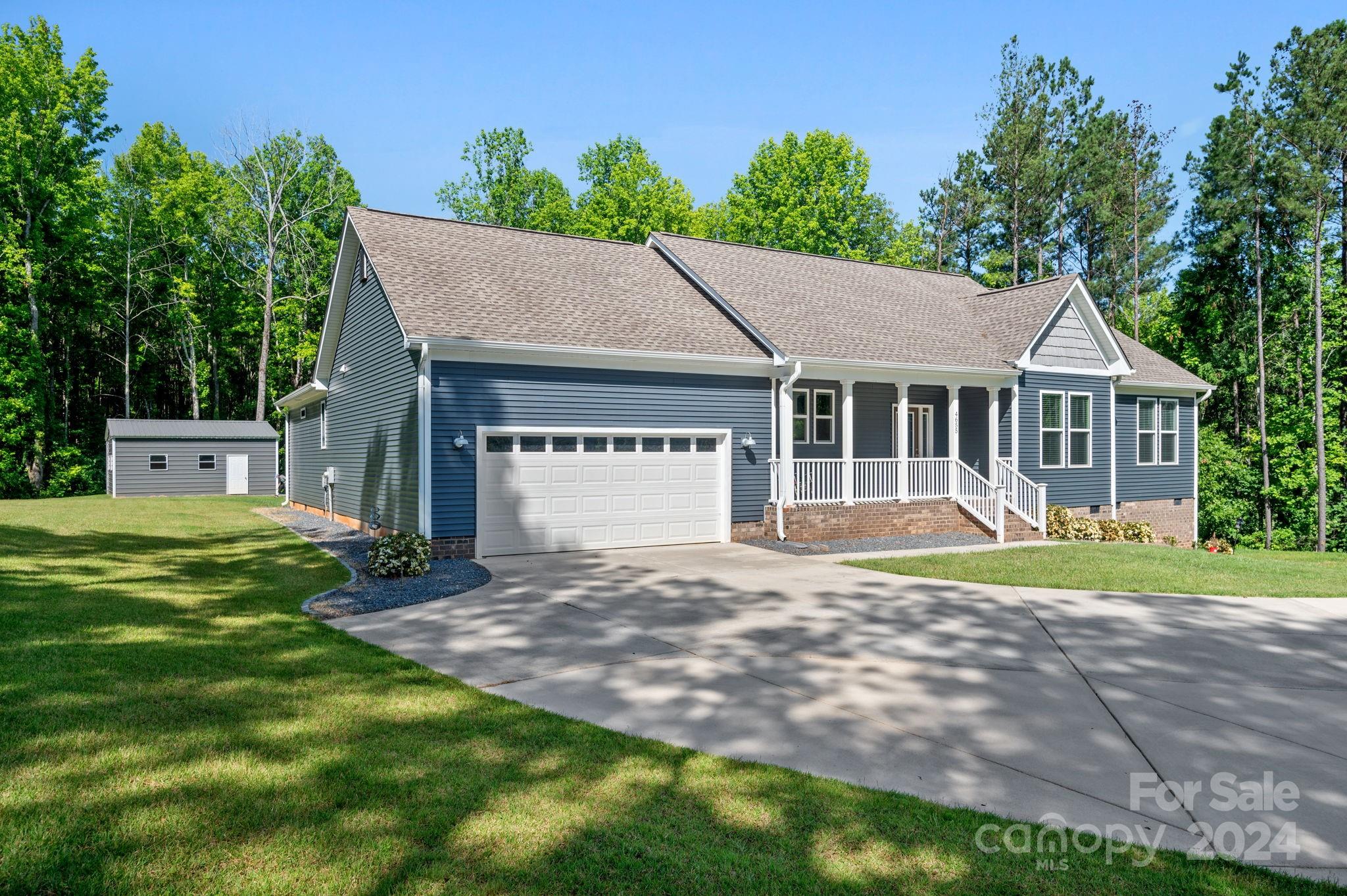 a house view with a garden space
