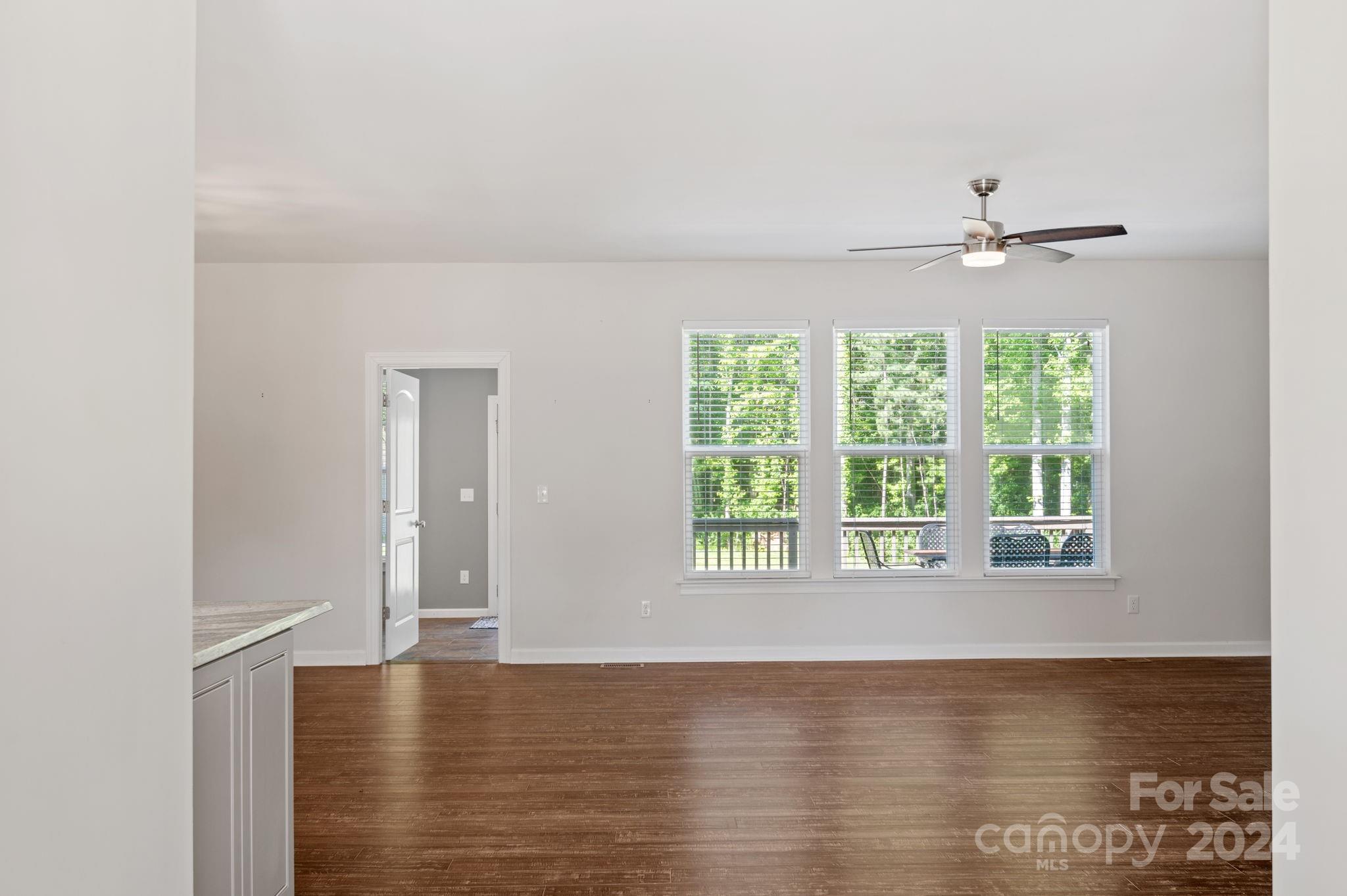 4655 Old Hickory Road Lancaster, SC 29720 - Photo 17 of 35 a view of an empty room with a window and kitchen view