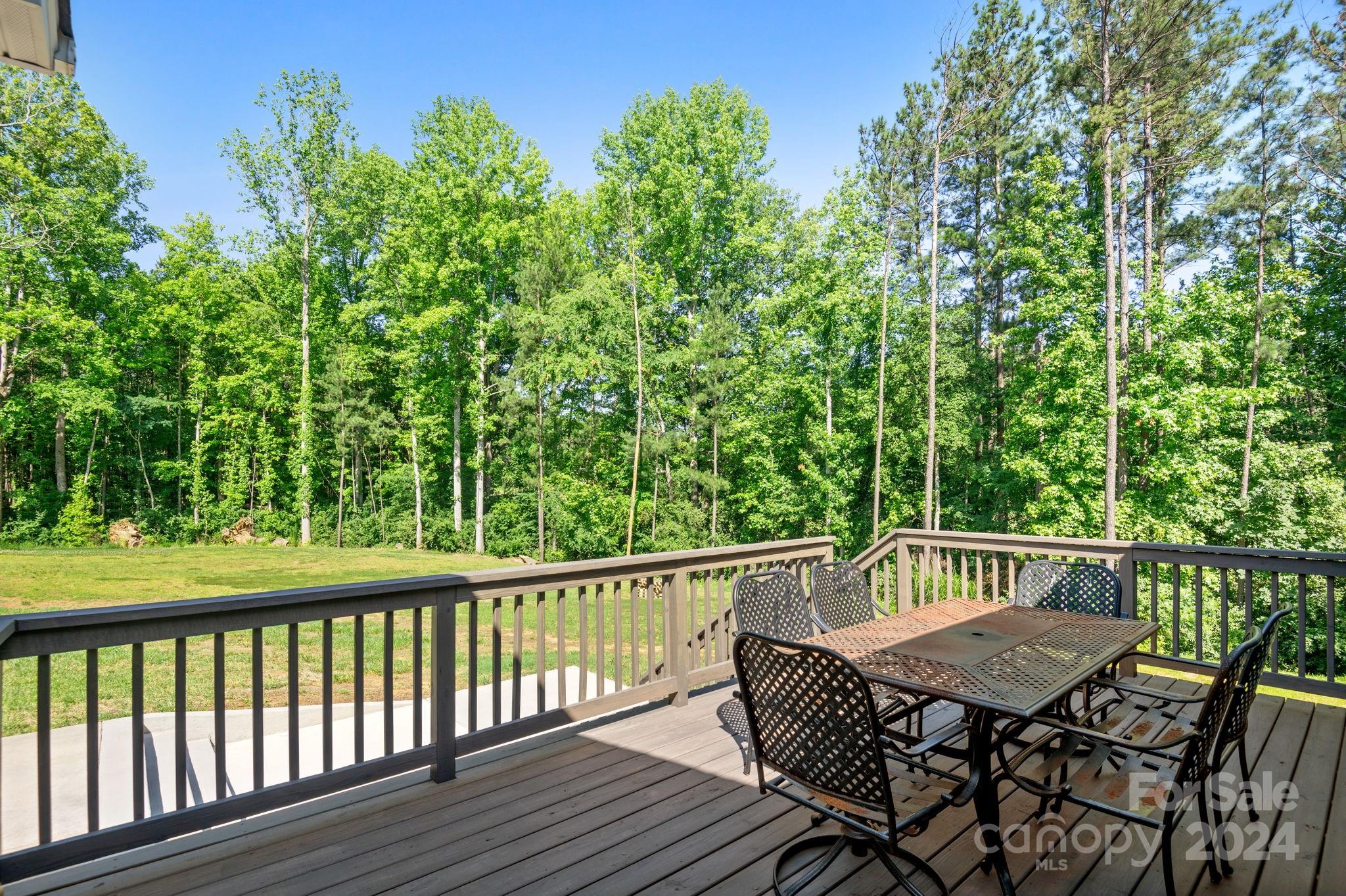 4655 Old Hickory Road Lancaster, SC 29720 - Photo 29 of 35 a view of a table and chairs on the roof deck
