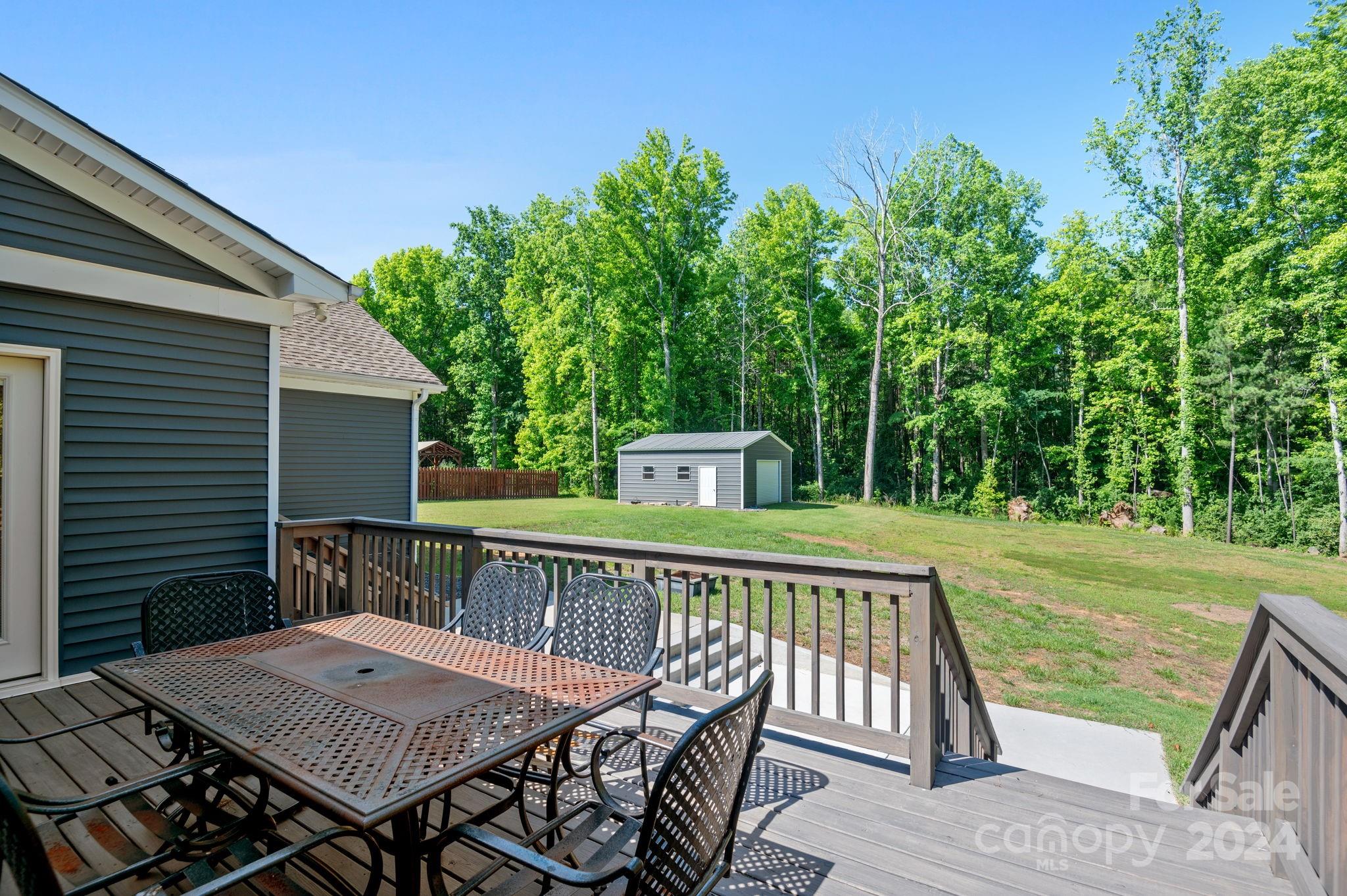 4655 Old Hickory Road Lancaster, SC 29720 - Photo 30 of 35 a view of a wooden deck and a patio