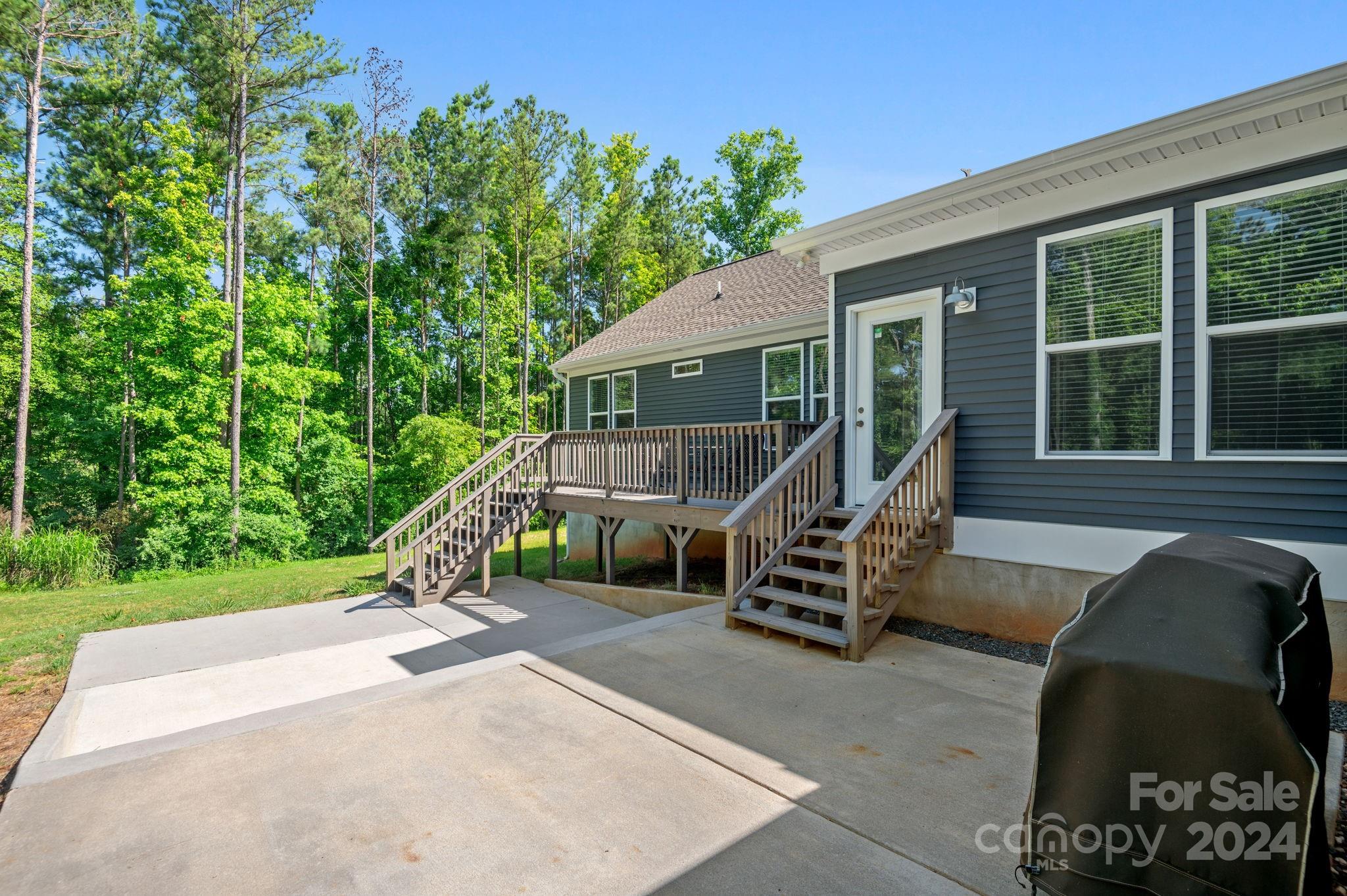 4655 Old Hickory Road Lancaster, SC 29720 - Photo 34 of 35 front view of a house with a garden