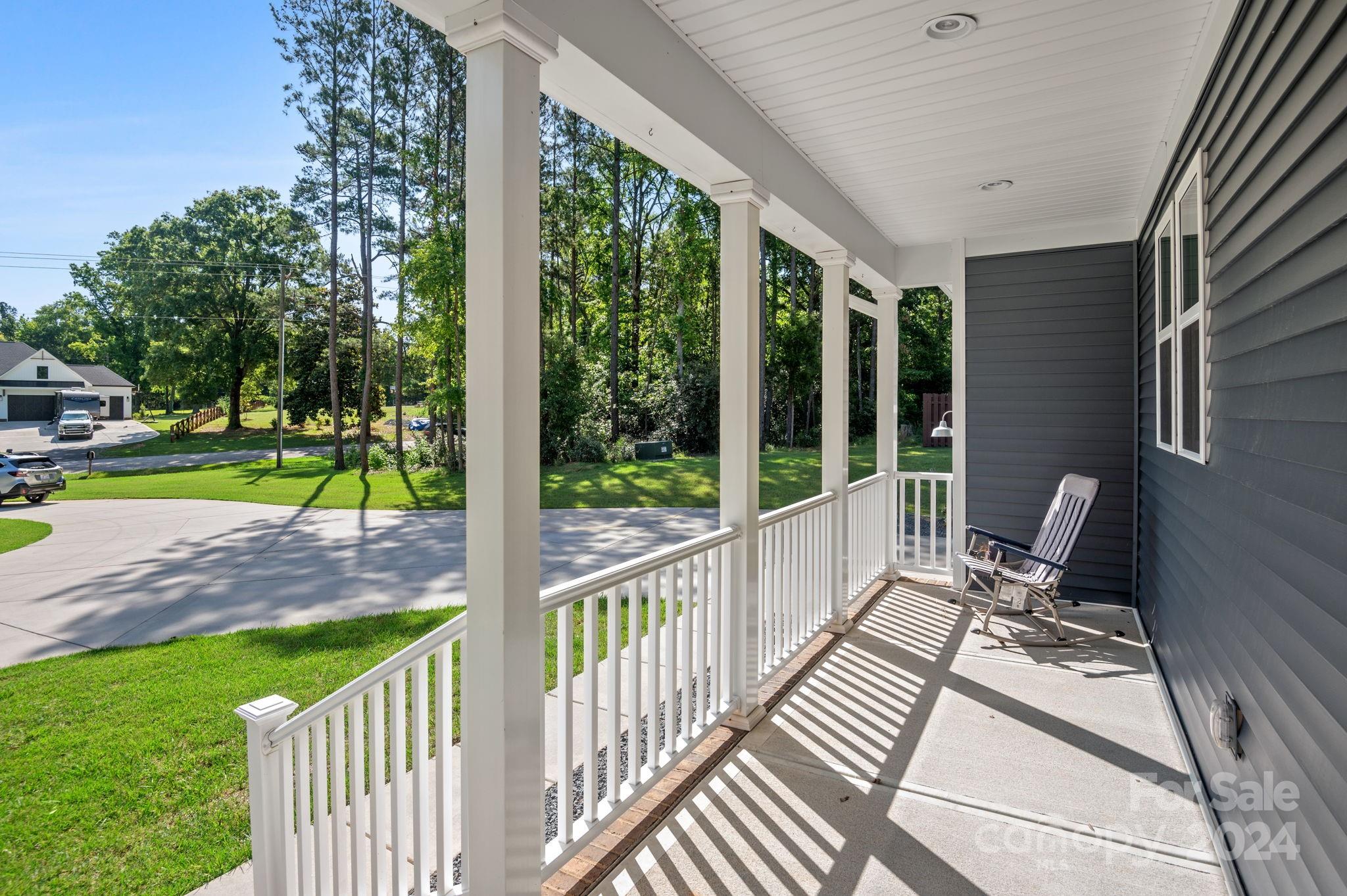 4655 Old Hickory Road Lancaster, SC 29720 - Photo 5 of 35 a view of a porch with furniture and garden