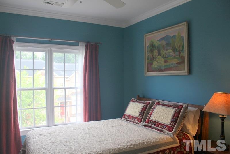 1322 Cameron View Court Raleigh, NC 27607 - Photo 13 of 22 a bedroom with a bed and a window