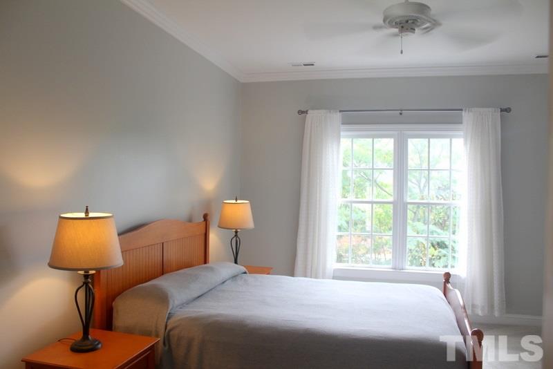 1322 Cameron View Court Raleigh, NC 27607 - Photo 15 of 22 a bedroom with a bed and a window