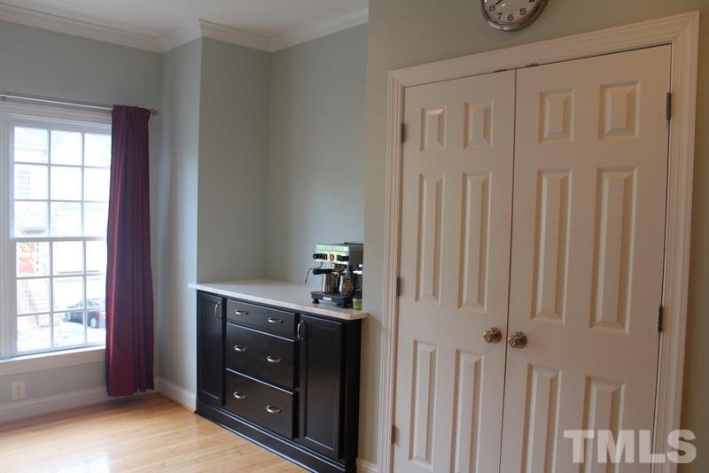 1322 Cameron View Court Raleigh, NC 27607 - Photo 3 of 22 a room with a dresser and a window