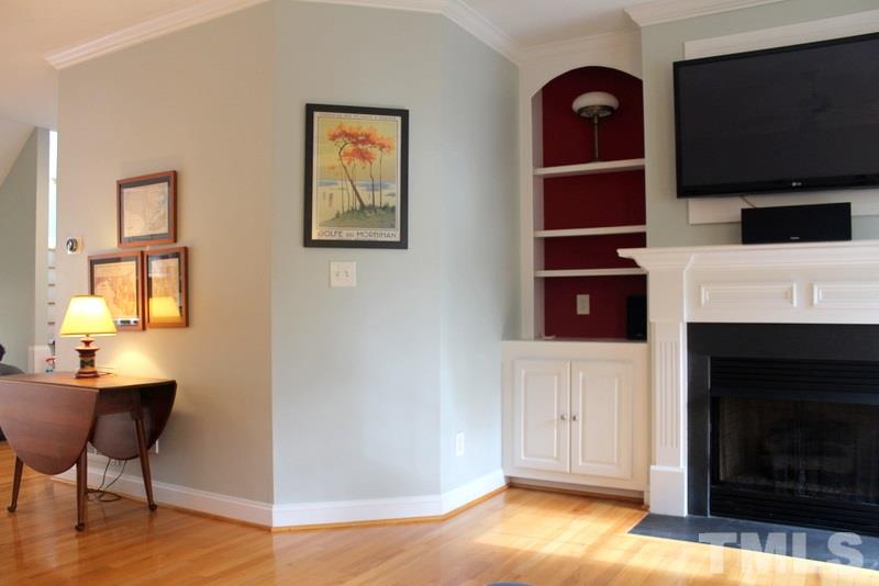 1322 Cameron View Court Raleigh, NC 27607 - Photo 8 of 22 a view of a livingroom with furniture and a fireplace