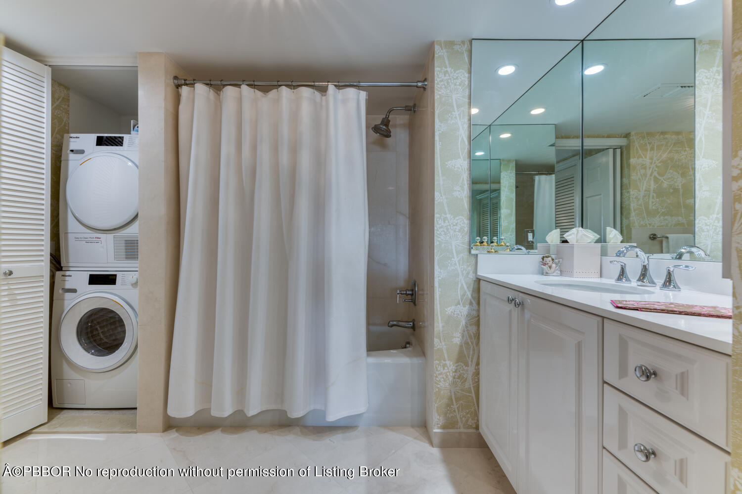 330 Cocoanut Row, Unit 5B Palm Beach, FL 33480 - Photo 18 of 32 a bathroom with a sink a toilet and shower