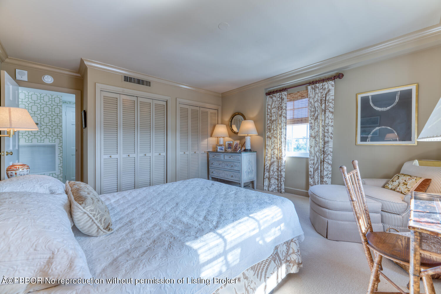 330 Cocoanut Row, Unit 5B Palm Beach, FL 33480 - Photo 22 of 32 a bedroom with a bed and wooden floor