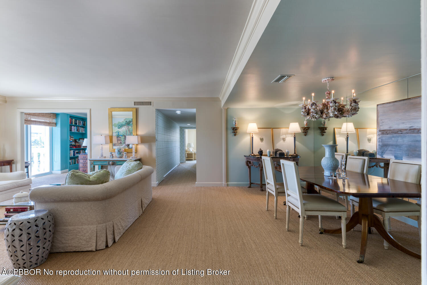 330 Cocoanut Row, Unit 5B Palm Beach, FL 33480 - Photo 26 of 32 a living room with furniture and a chandelier