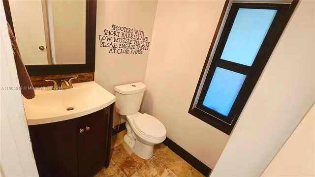 a close view of a utility room with washer and dryer