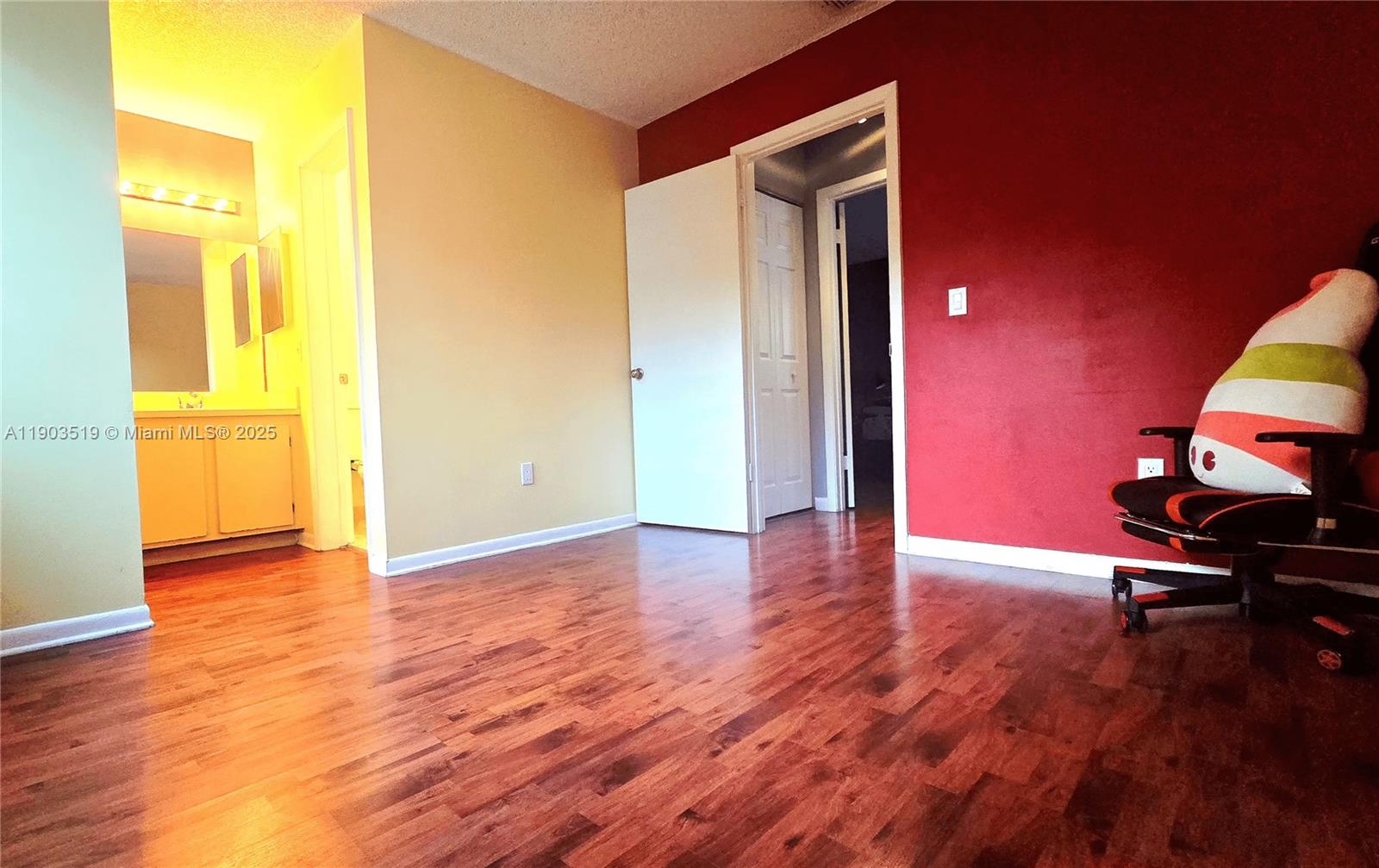 10515 Southwest 153rd Court, Unit 3 Miami, FL 33196 - Photo 18 of 26 a view of a room with wooden floor and a sink