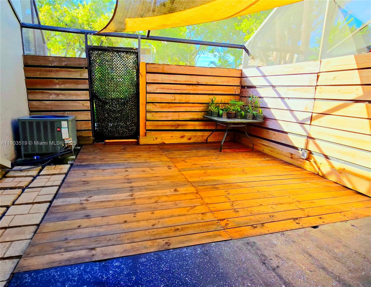 10515 Southwest 153rd Court, Unit 3 Miami, FL 33196 - Photo 26 of 26 a view of a terrace with outdoor seating