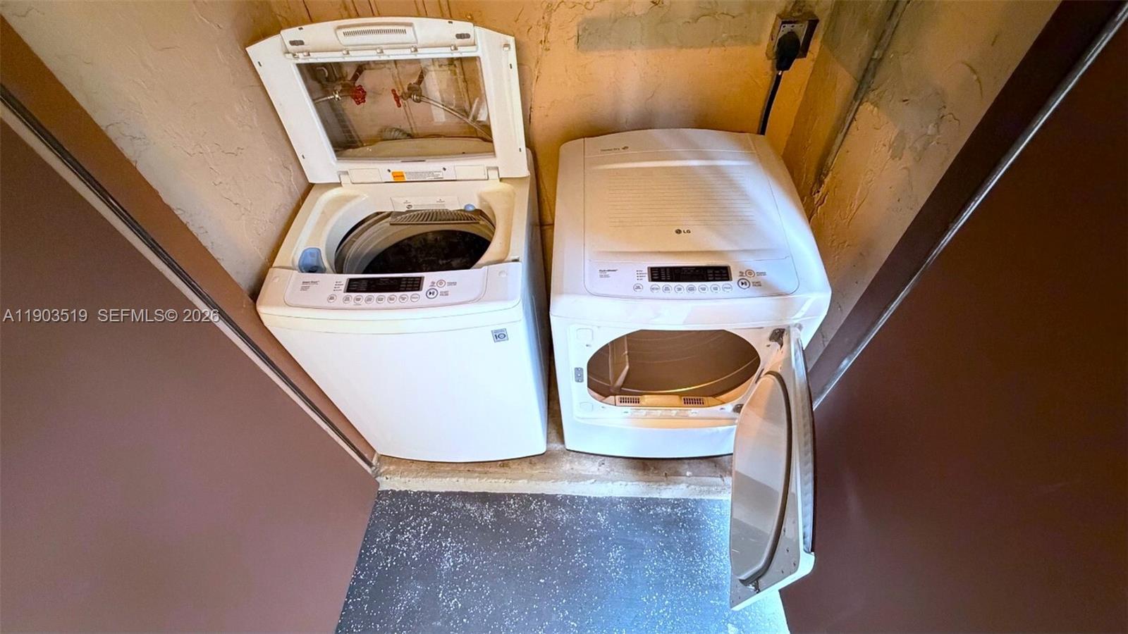 10515 Southwest 153rd Court, Unit 3 Miami, FL 33196 - Photo 32 of 32 a utility room with dryer and washer