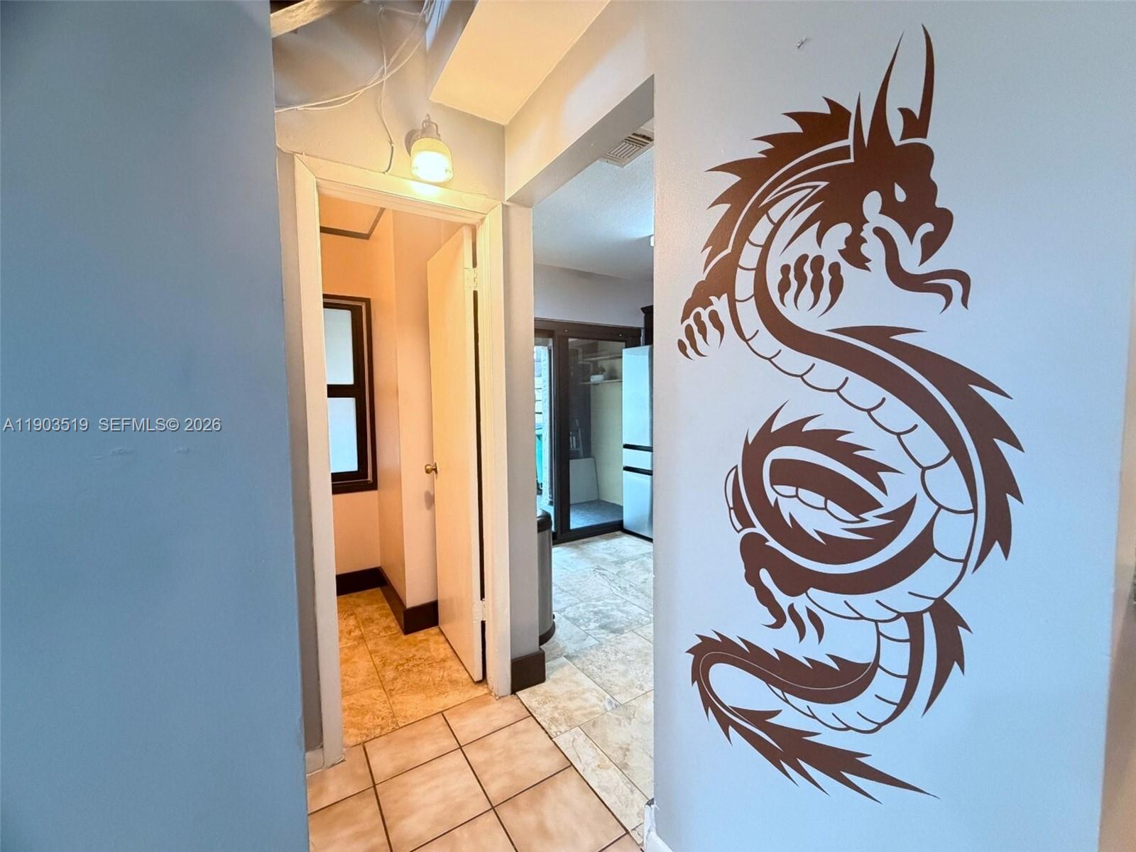 10515 Southwest 153rd Court, Unit 3 Miami, FL 33196 - Photo 10 of 32 a view of a entryway door