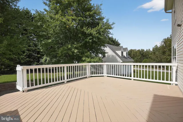 a view of a wooden roof deck