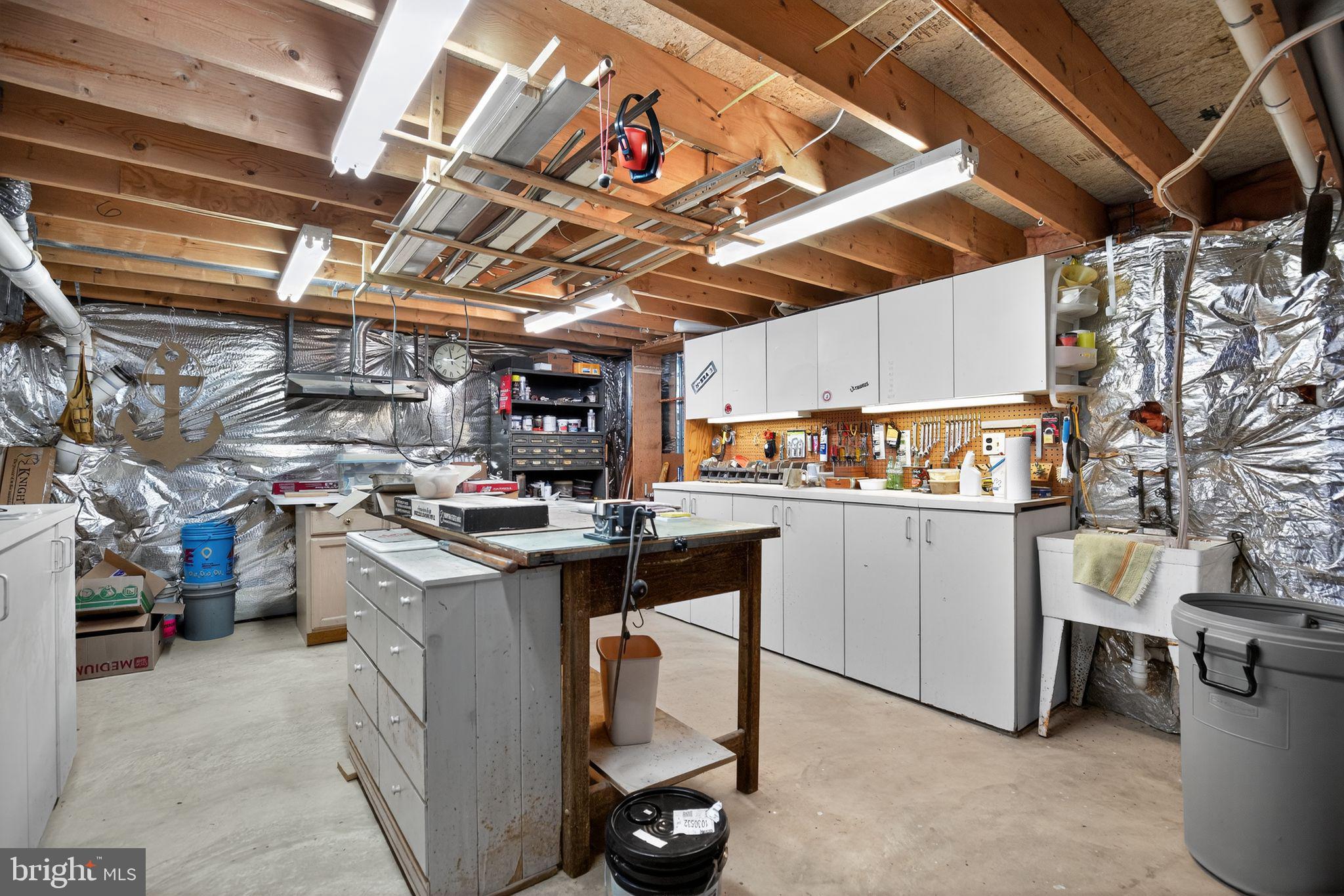3100 Drawfield Lane Huntingtown, MD 20639 - Photo 29 of 37 Lower level workshop area.