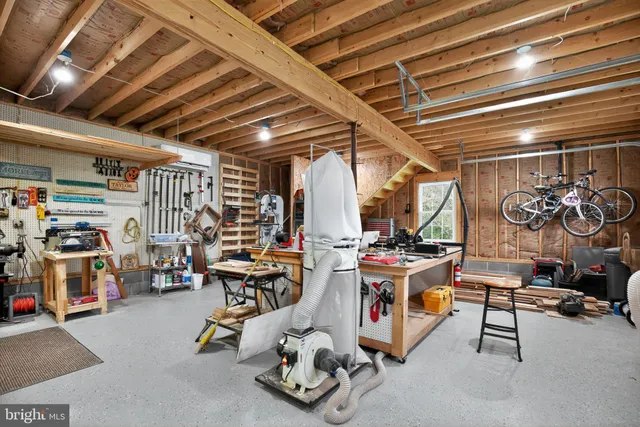 a view of a patio with table and chairs