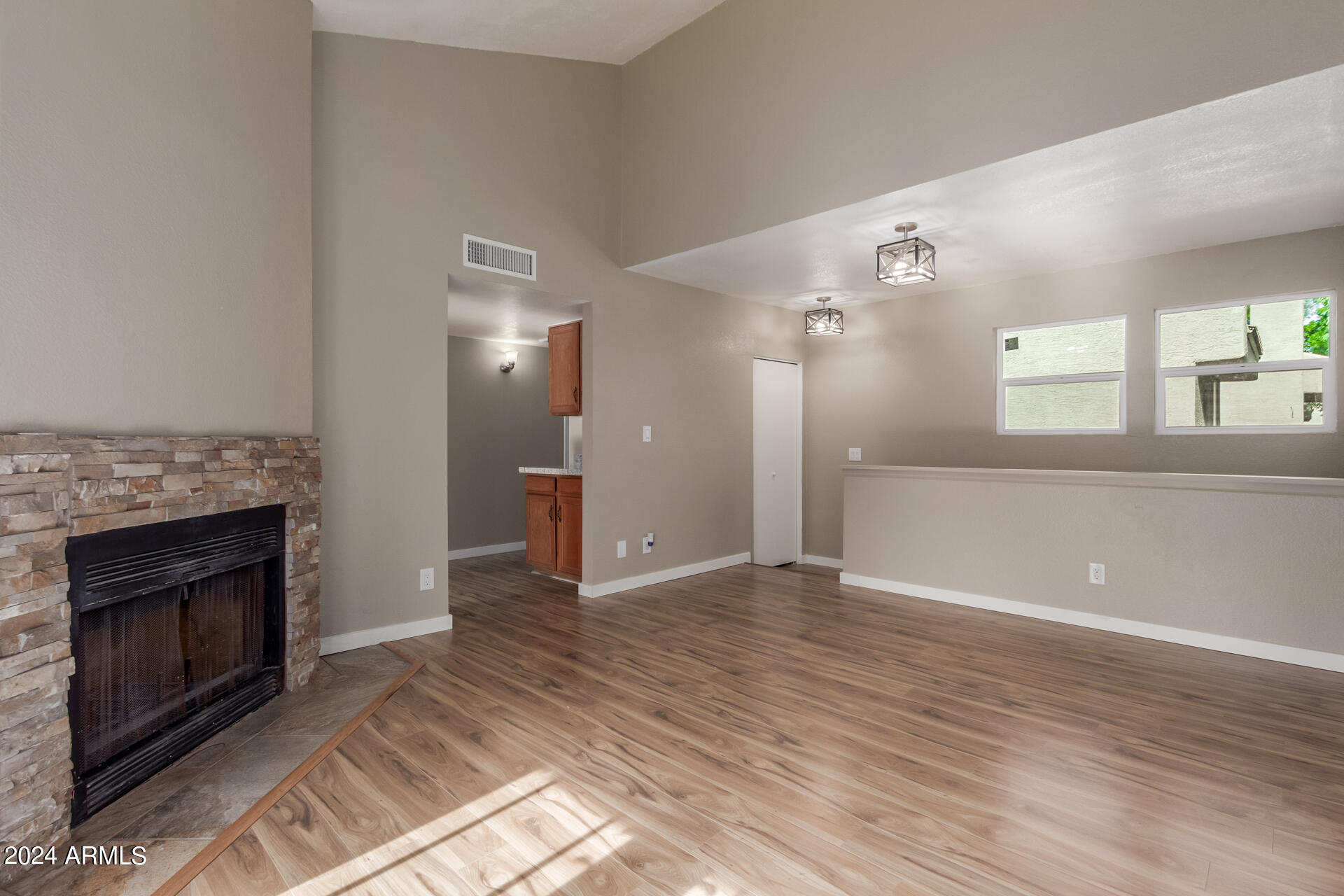 2834 South Ext Road, Unit 2058 Mesa, AZ 85210 - Photo 12 of 33 a view of a livingroom with a fireplace