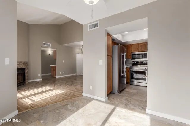 a view of a hallway with a furniture