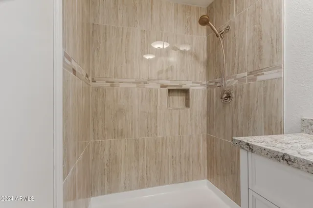 a view of a bathroom with shower