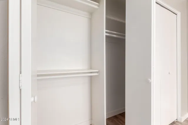 a view of cabinets with wooden floor
