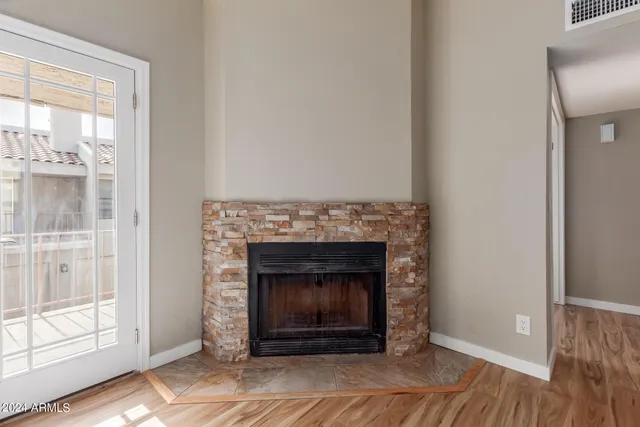 a living room with a fireplace