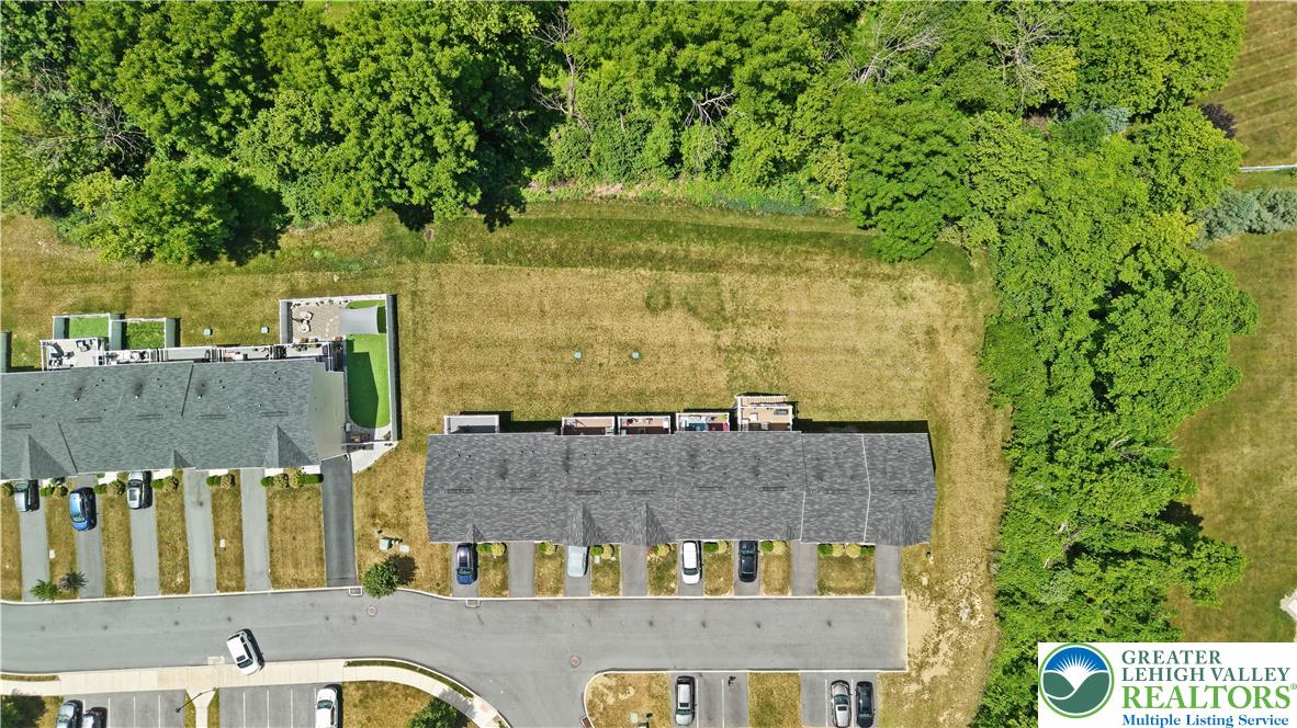 2336 Alex Road Easton, PA 18040 - Photo 32 of 35 An aerial perspective reveals a vibrant community with ample green space and organized parking.