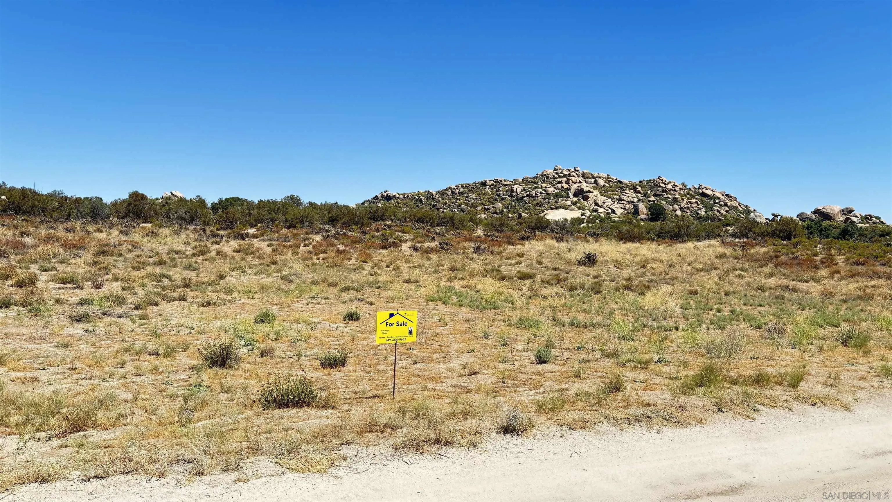 1 Jewel Valley Rd Boulevard, Unit 1 Jacumba, CA 91934 - Photo 3 of 6 a view of a dry yard with wooden fence