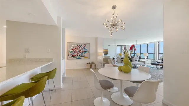 a kitchen with stainless steel appliances white cabinets and a stove
