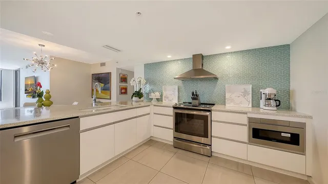 a kitchen with a stove and a sink