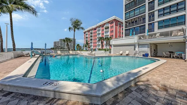 a view of a room with gym equipment and floor to ceiling window