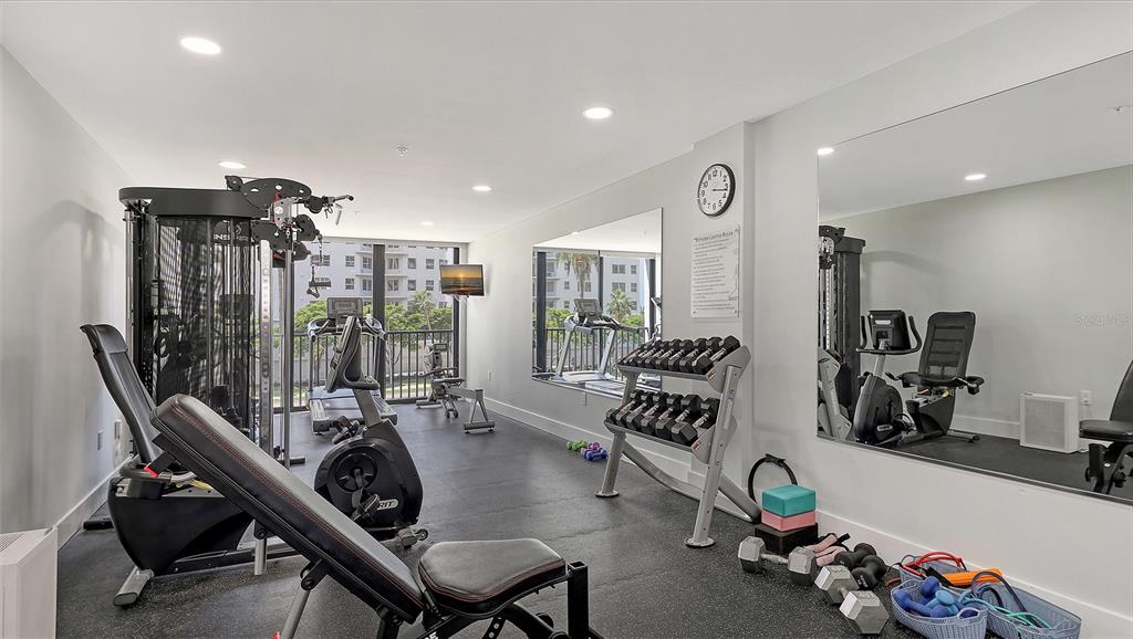 11 Sunset Drive, Unit 501 Sarasota, FL 34236 - Photo 54 of 63 a view of a room with gym equipment