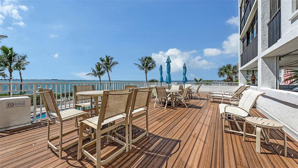 11 Sunset Drive, Unit 501 Sarasota, FL 34236 - Photo 56 of 63 an outdoor space with seating
