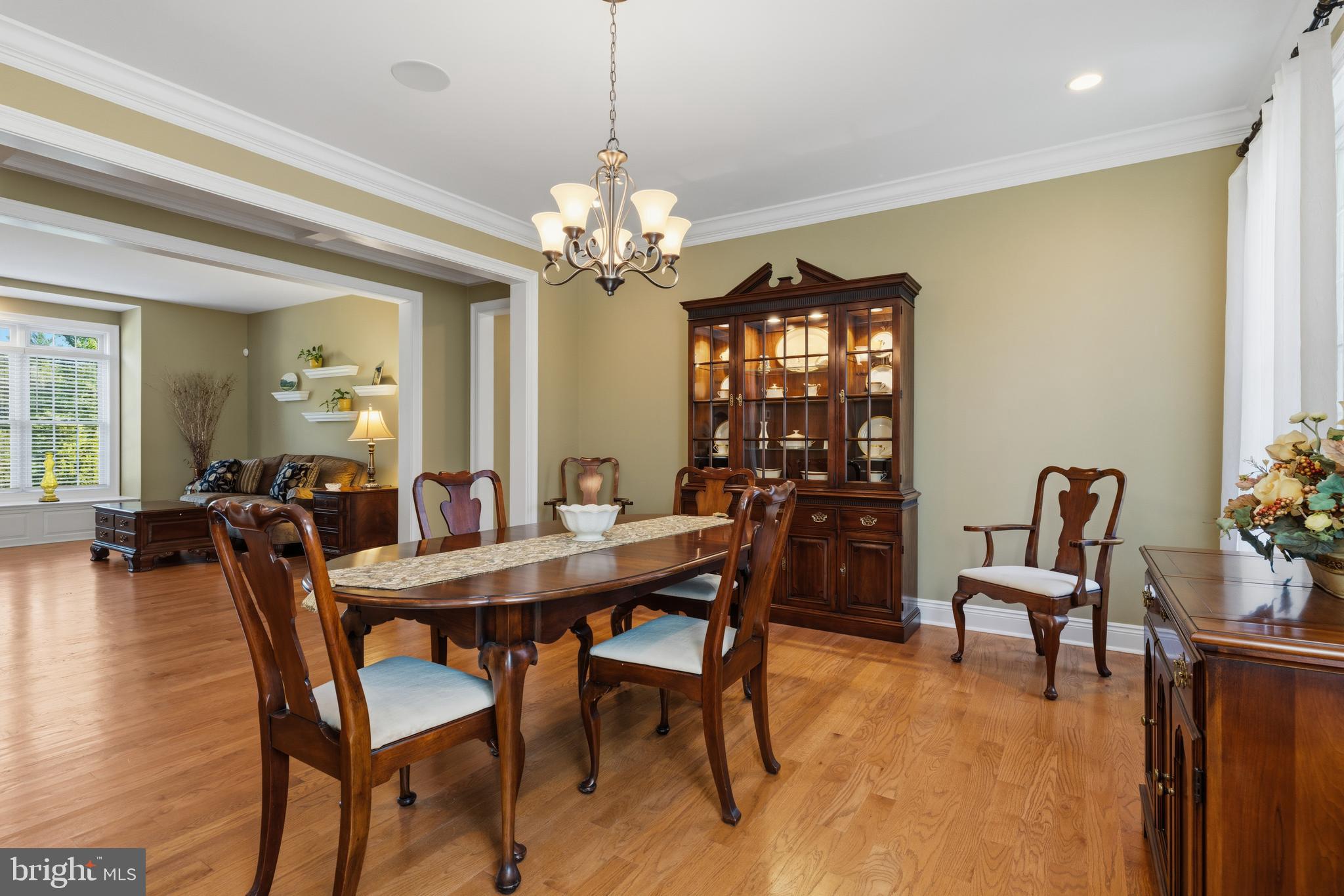 1031 Coates Road Jenkintown, PA 19046 - Photo 30 of 66 a view of a dining room with furniture and a chandelier
