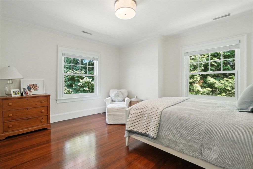 15 Winthrop Road Lexington, MA 02421 - Photo 27 of 39 a bed room with a bed and a window