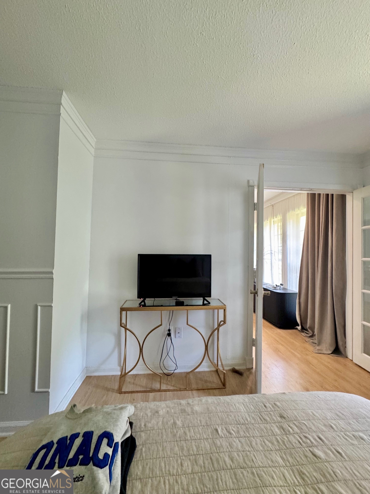 24311 Plantation Drive Northeast, Unit 311 Atlanta, GA 30324 - Photo 16 of 36 a view of a livingroom with workspace and a window