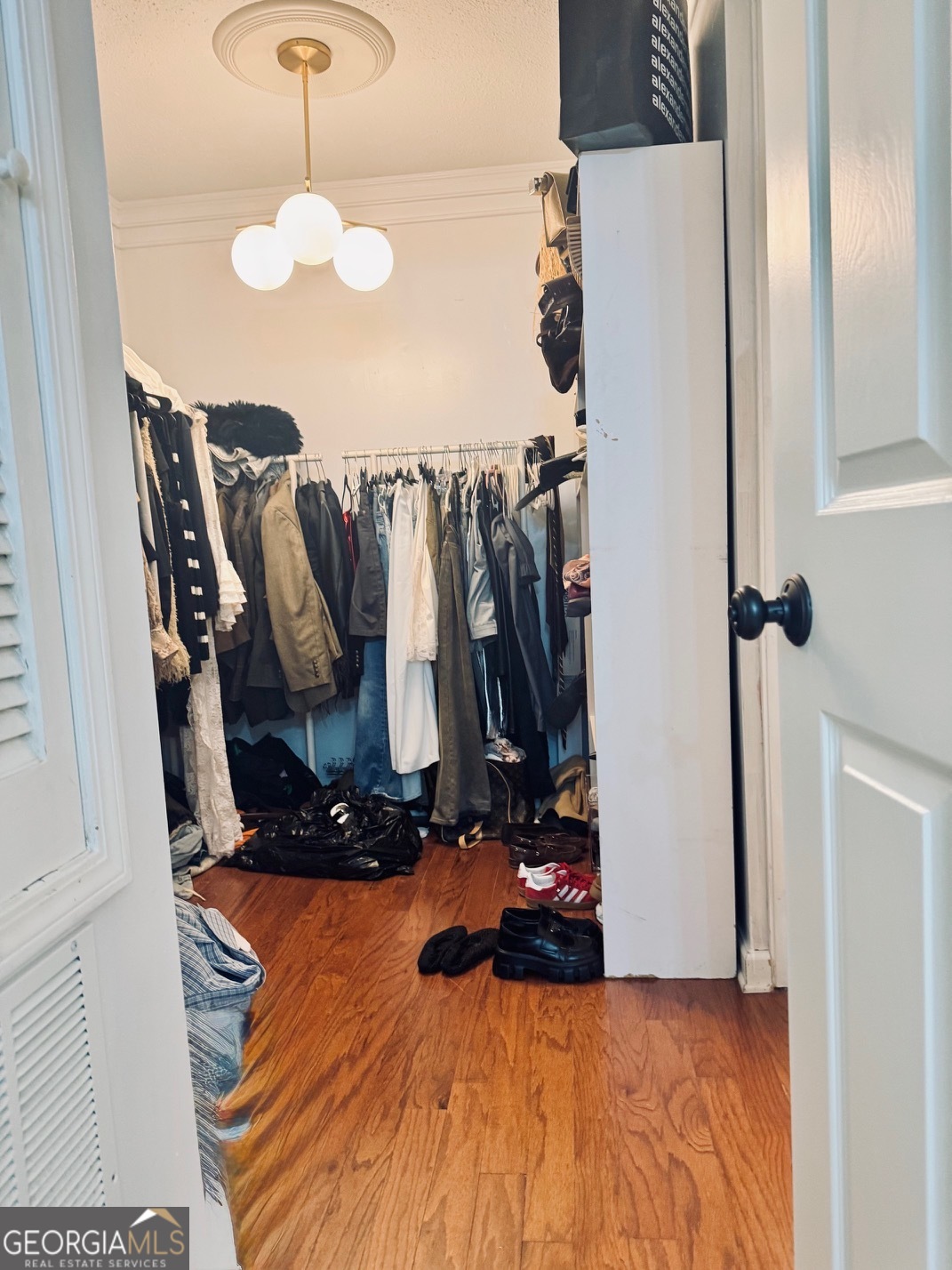 24311 Plantation Drive Northeast, Unit 311 Atlanta, GA 30324 - Photo 27 of 36 a view of a closet with storage