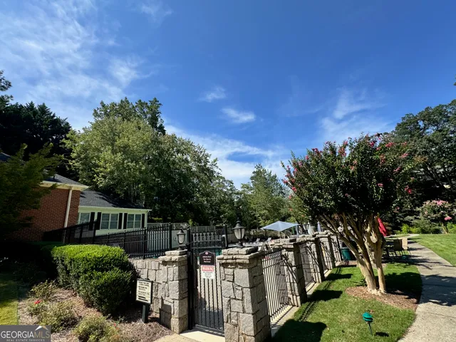 a view of a house with a street from a garden